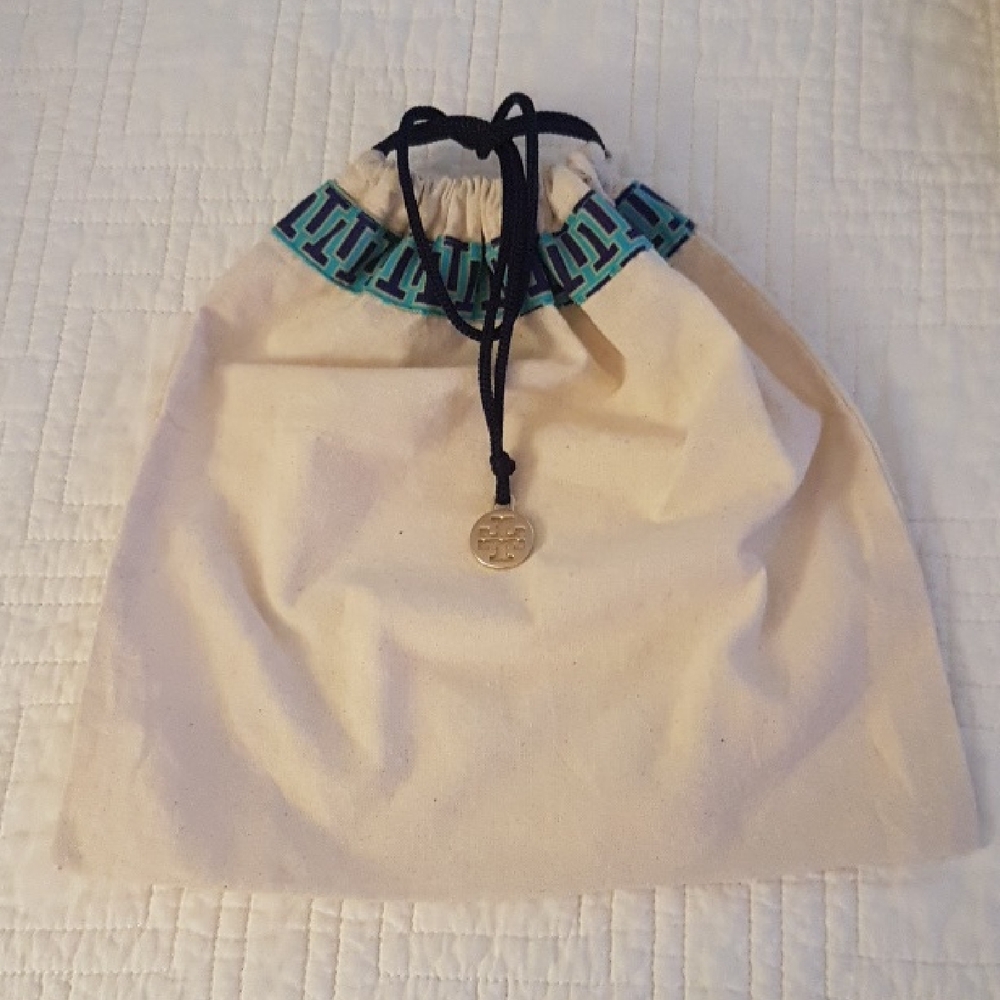 Tory Burch Canvas Drawstring Bag with Blue And Purple Accents.